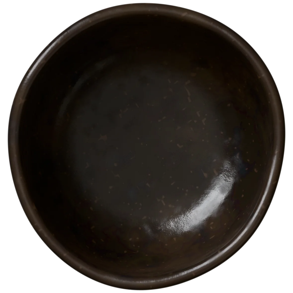 An empty black raku tea bowl seen from above.